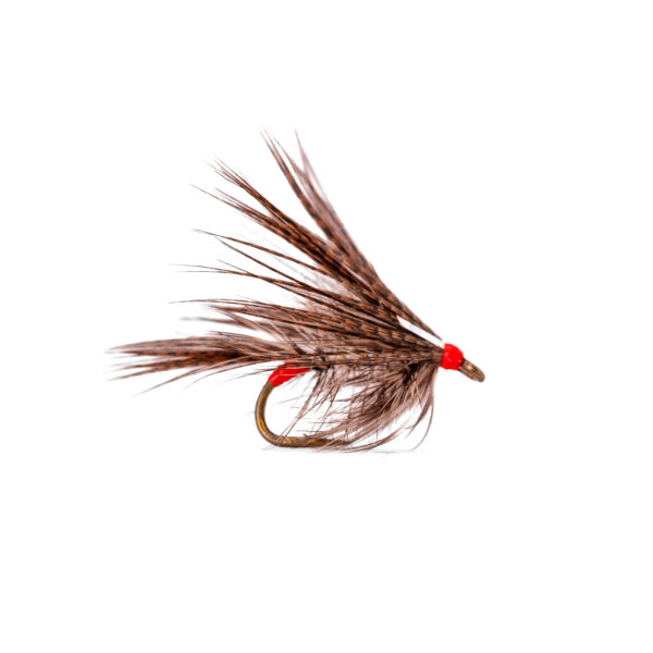 Caledonia Silver Dabbler B/L wet fly with silver body, palmered hackle, bronze mallard cloak and a red head
